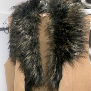 Black and brown fuzzy vest